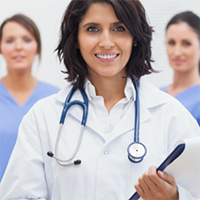 Doctors in hospital garb.